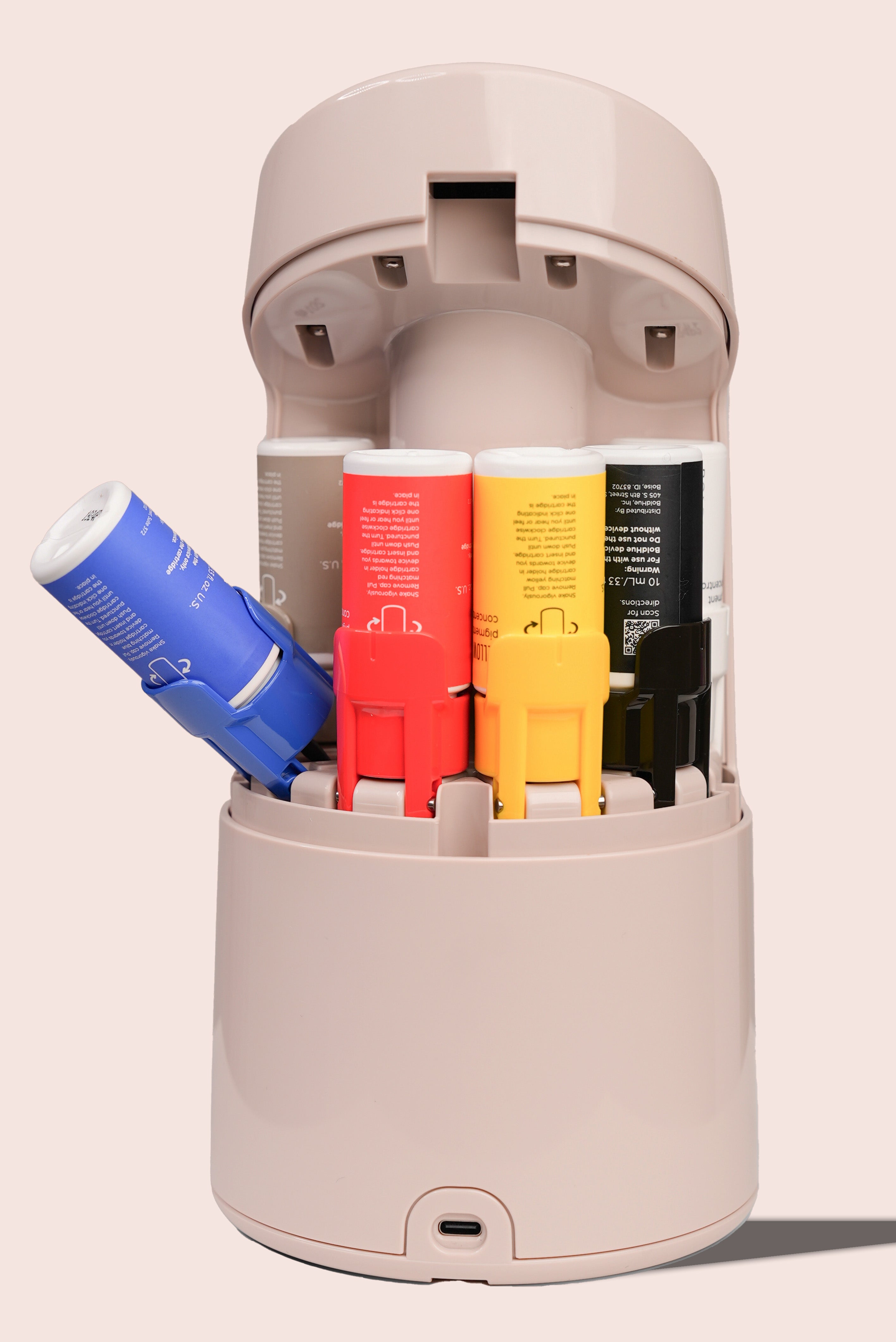 the back of the boldhue device without the back cover showing where the blue cartridge is to be installed