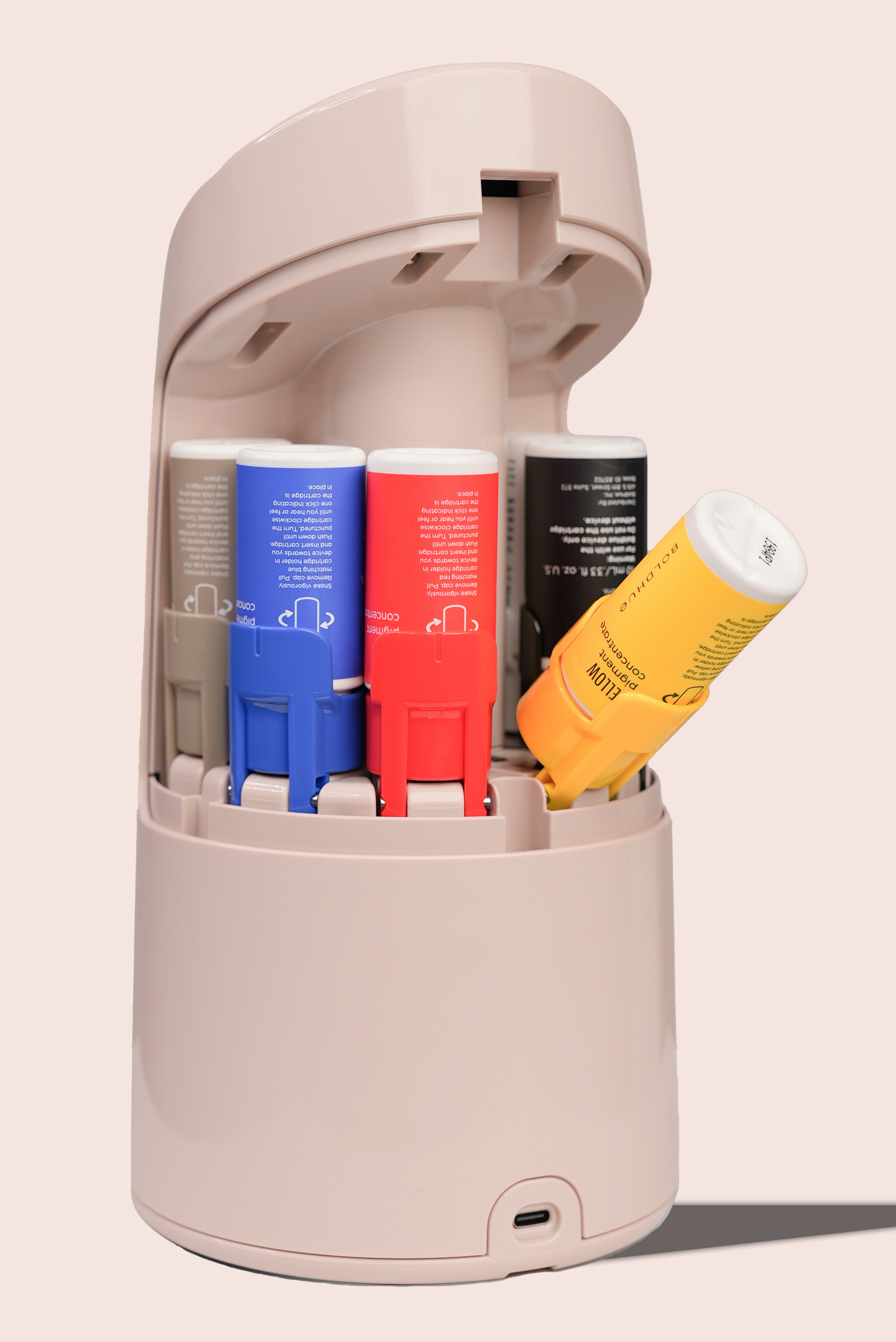 the back of the boldhue device without the back cover showing where the yellow cartridge is to be installed